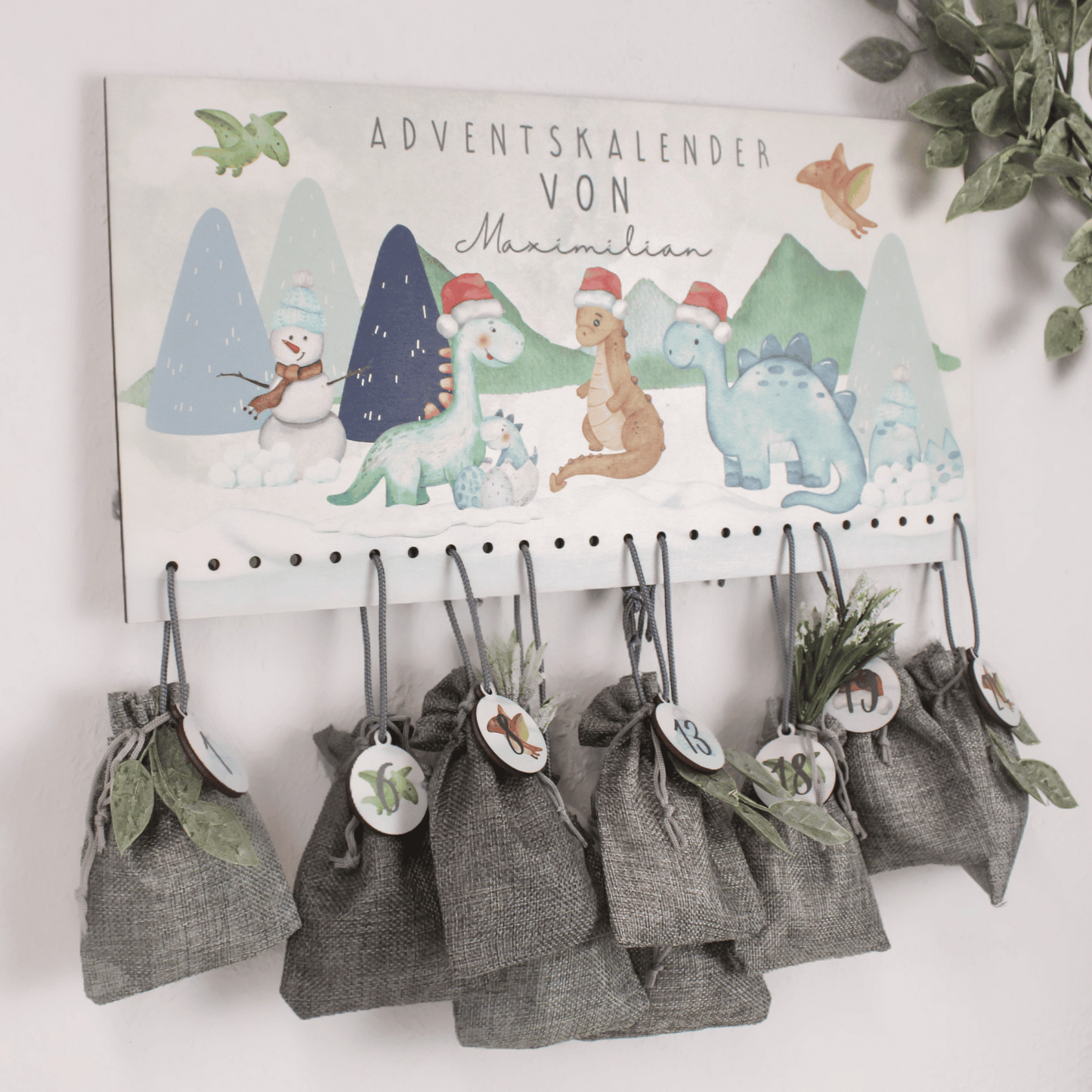 Adventskalender mit Wunschnamen - Schnee Dinos weihnachtlich